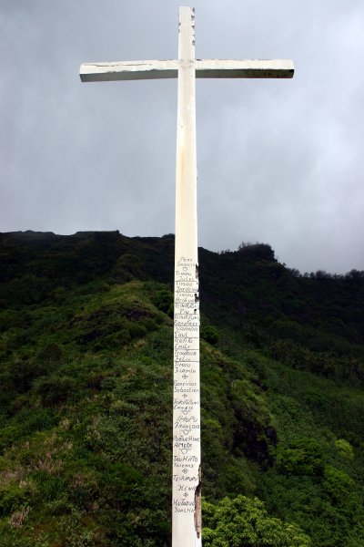 Cross with names carved in it.